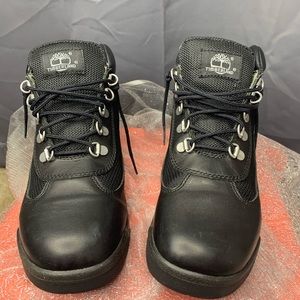 All black Timberland field boots